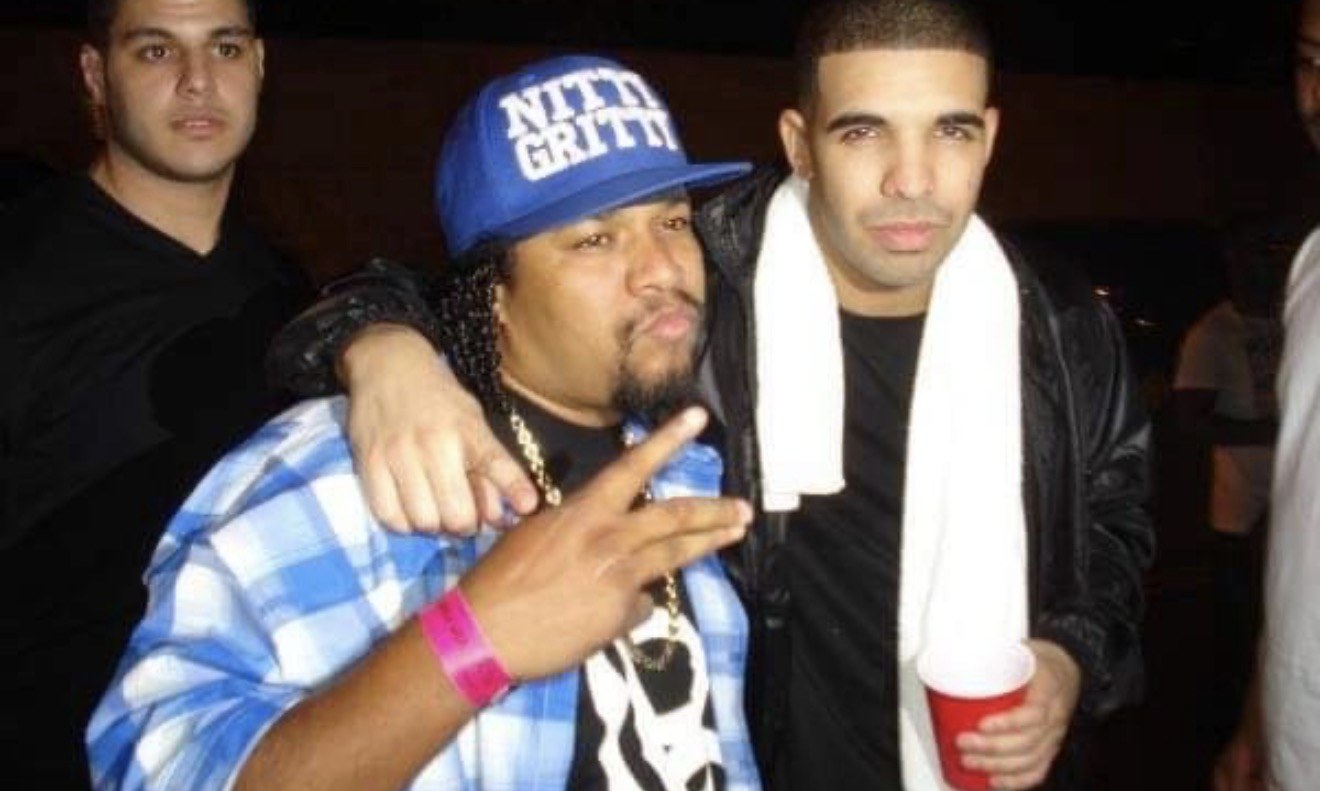 Frank “Nitty” Gibson Jr. with a friend at an event